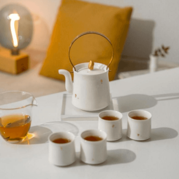 White Porcelain Tea Set With Gold Handle
